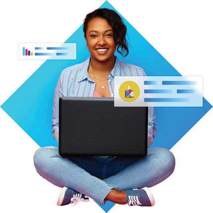 Woman sitting cross-legged with a laptop, smiling