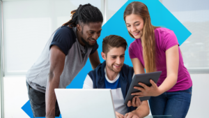Three people reviewing digital content together, representing mental availability as a framework for identifying brand growth opportunities